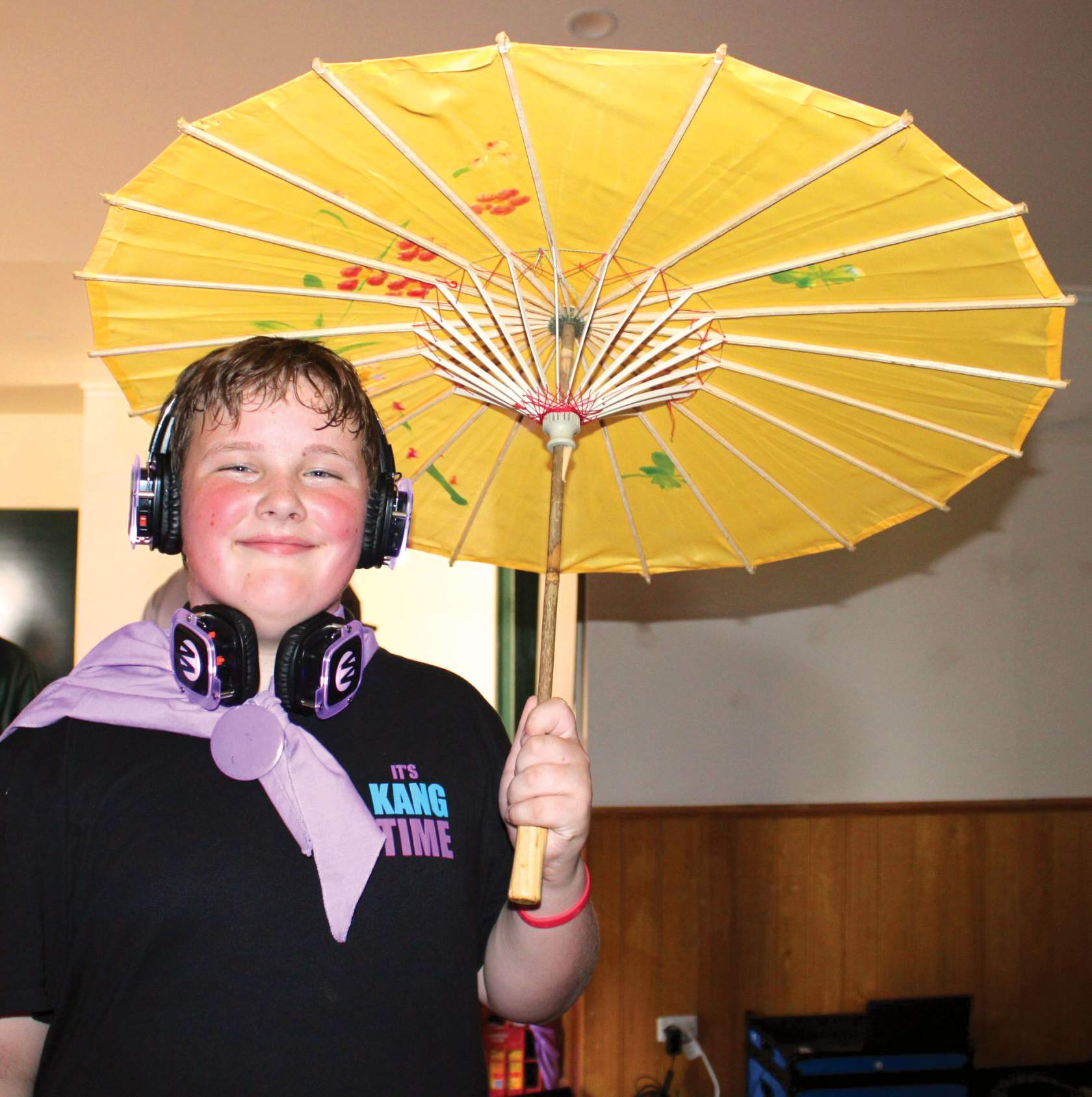 Boy with yellow chinese umbrella